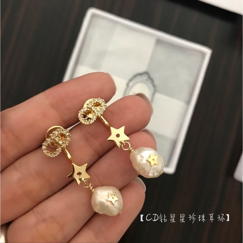 ch**an D*or earrings
